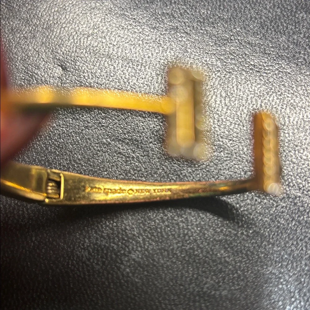 Kate Spade Raising The Bar gold tone bangle